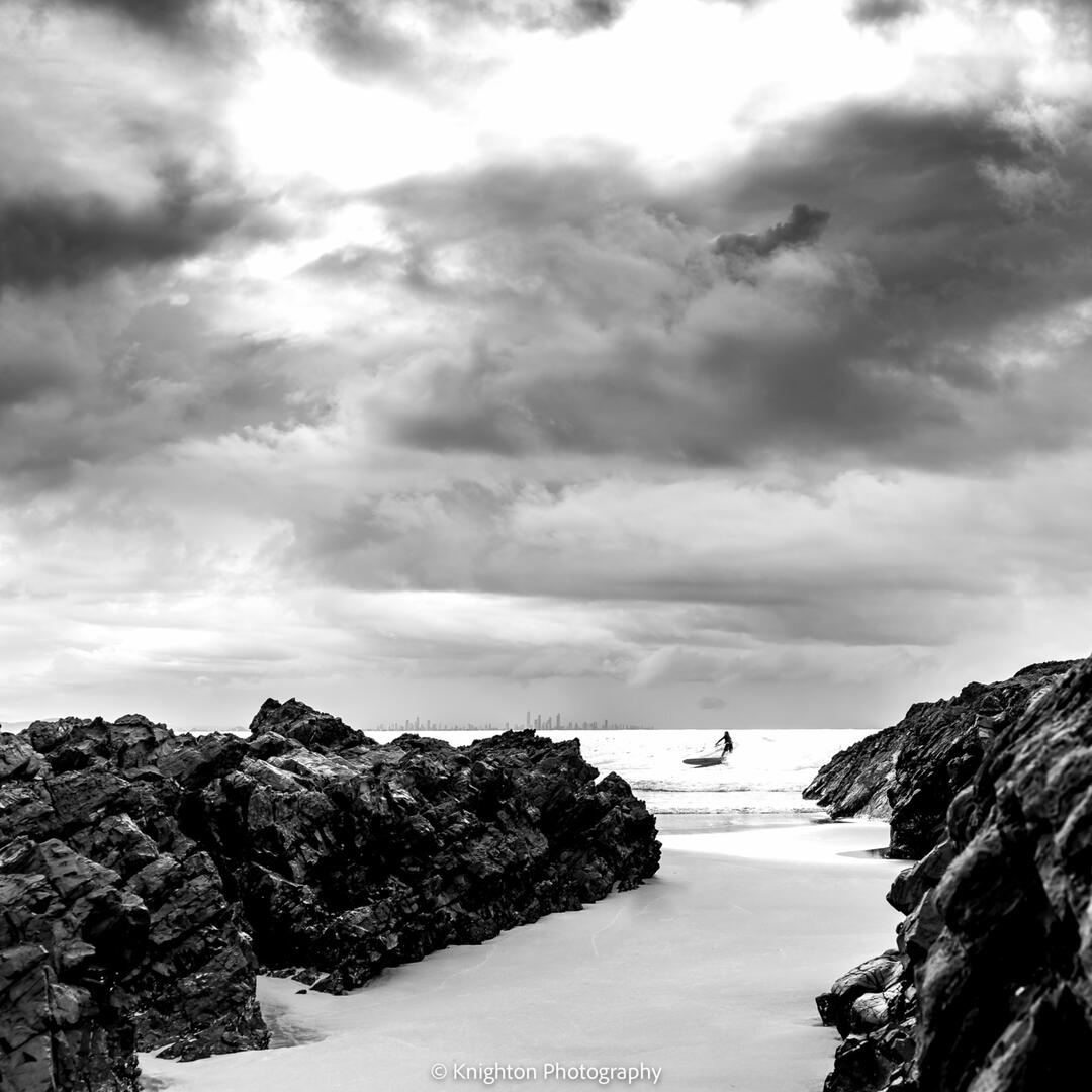 Surfer at Rainbow beach, Queensland Surfer at Rainbow beach, Queensland